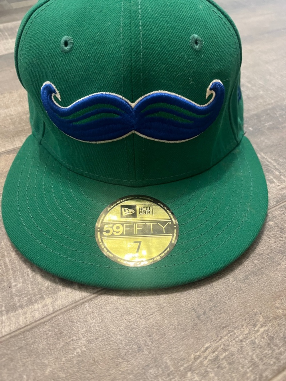 New Era Green Fitted Cap with Blue Mustache Patch